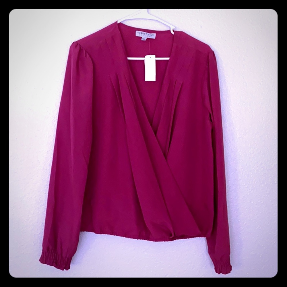Women’s pink work blouse.